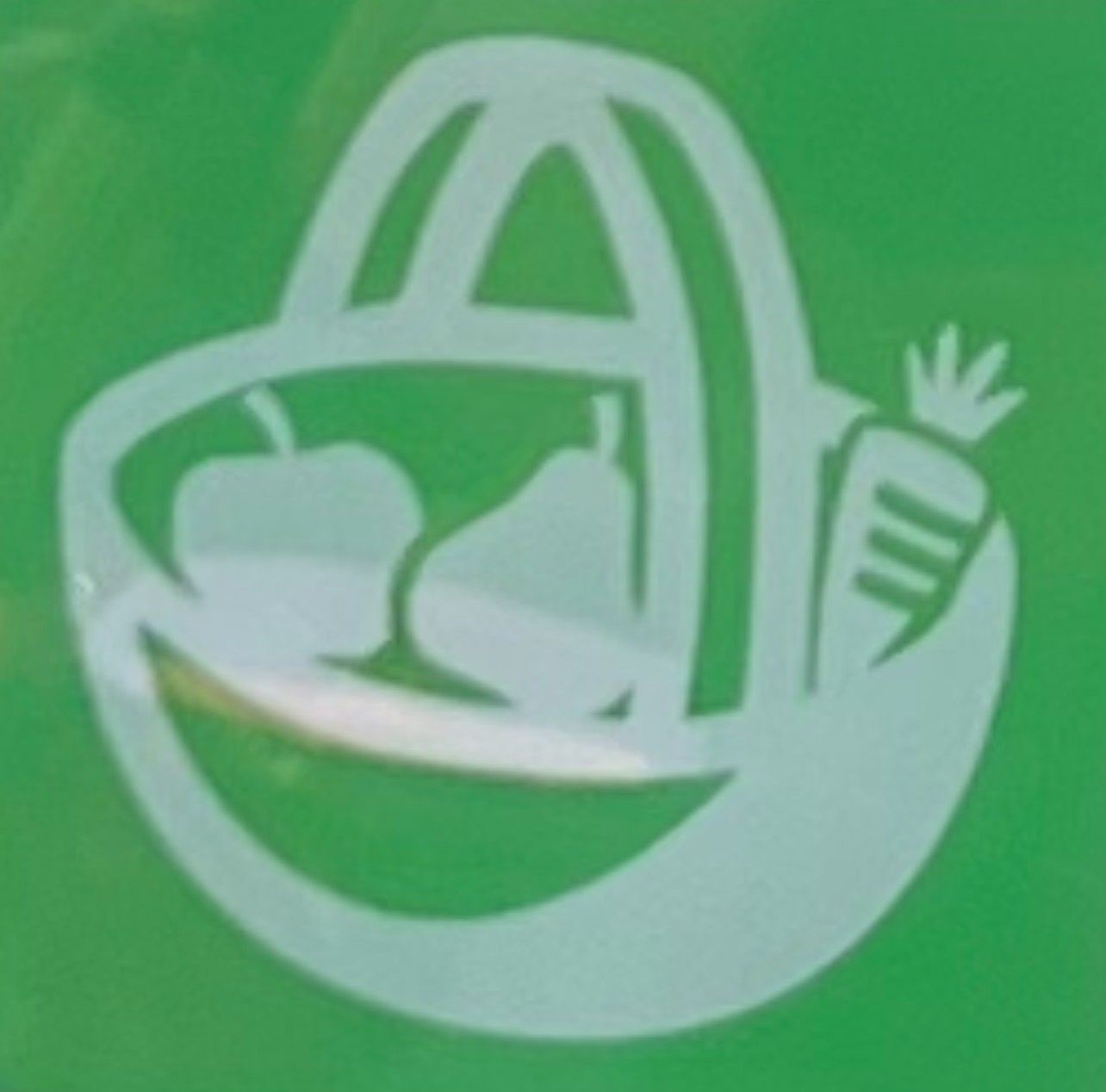 Norfolk council 'We Buy Local' logo; white basket with an apple, pear, and carrot on a green background